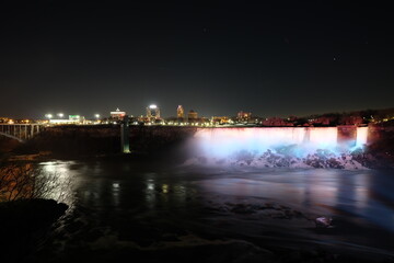 Naklejka na ściany i meble American Falls, Bridal Veil Falls, Niagara Falls at night, with light pointing at it