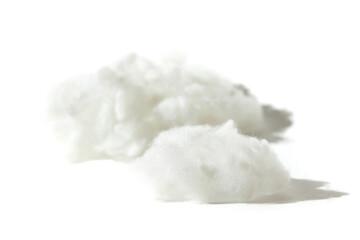 Modern bio-polymeric synthetic filler for fabric toys on on white background. White synthetic fabrics, studio shot. It is alternative down