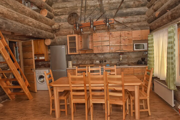 Obraz na płótnie Canvas dining room interior of a wooden house,