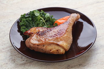Roasted duck leg with orange sauce