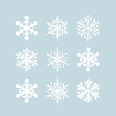 Fototapeta na wymiar A set of snowflakes to create a winter pattern. Hand-drawn style