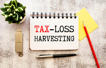 Conceptual photo about Tax-Loss Harvesting with handwritten text
