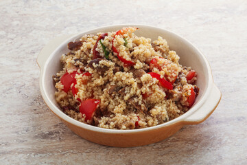 Arabic cous cous with meat and tomato