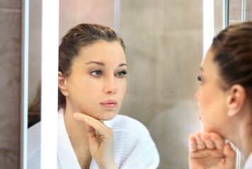 Magic anti-aging cream.Applying the cream.