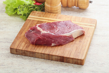 Raw rib-eye beef steak black angus