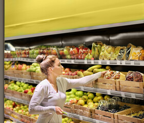 Woman buying fruits at the market