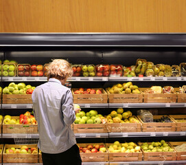 Man buying fruits at the market