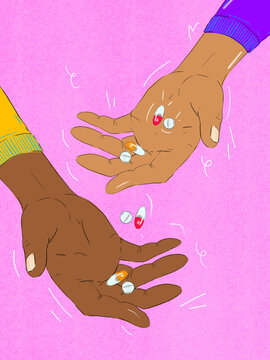hands holding pills