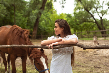 Walk with a horse near the river