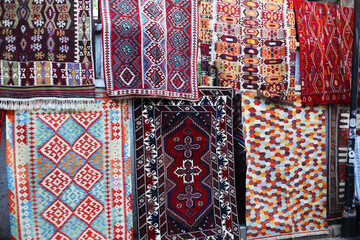 Many oriental carpets and rugs hanging in Cappadocia, Turkey. 