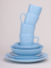 blue ceramic dishes on a light background - 475609447