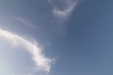 A sky with white clouds, in concept for backgrounds.