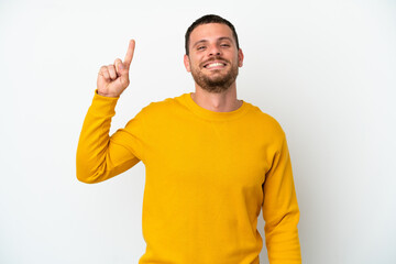 Young Brazilian man isolated on white background pointing up a great idea