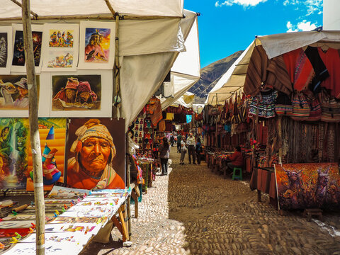 Pisac, Peru, June 2016 - view of some beautiful paintings and artworks at a famous market at Pisac