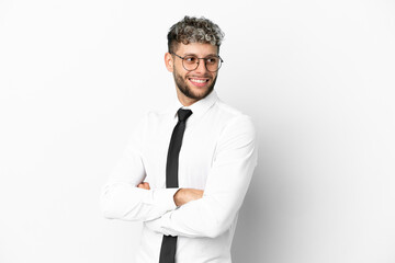 Business caucasian man isolated on white background with arms crossed and happy