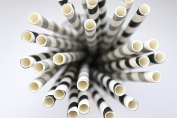 Ecological paper straws, gray-black and white with different patterns.