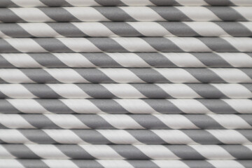 Ecological paper straws, gray-black and white with different patterns.