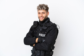 Fototapeta premium SWAT caucasian man isolated on white background with arms crossed and looking forward