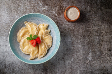 Dumplings, filled with strawberries. A healthy, sweet breakfast
