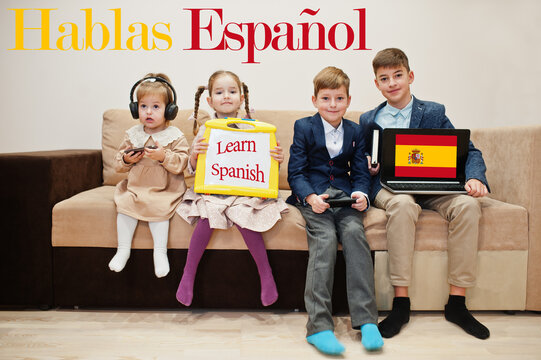 Four kids show inscription learn spanish. Foreign language learning concept. Hablas Espanol.