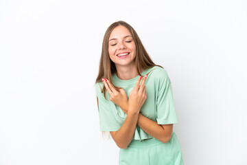 Young Lithuanian woman isolated on white background smiling and showing victory sign