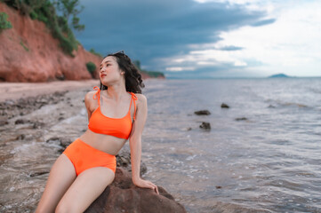 Fototapeta na wymiar woman in bikini on the beach