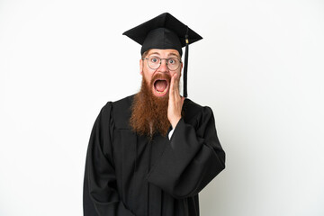 Young university graduate reddish man isolated on white background with surprise and shocked facial expression