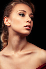 Fototapeta premium young sensual blond woman posing on black background, lifestyle people concept