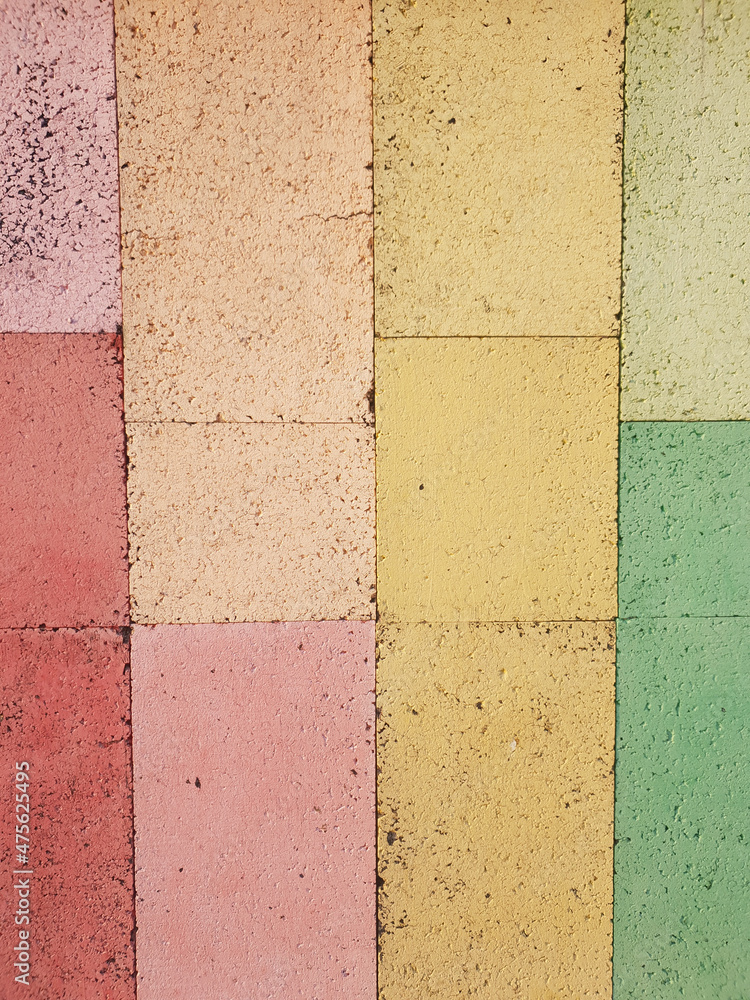 Sticker Closeup of a colorful brick wall - perfect for a texture and background