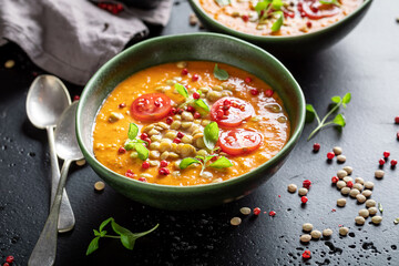 Green lentil soup as healthy and spicy appetizer.