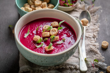 Spicy borsch soup with croutons and cream.
