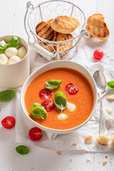 Red creamy tomato soup as healthy and spicy appetizer.