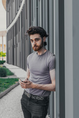 Fototapeta premium boy looking with his phone in hand