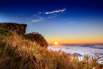 Starlight Sunrise scene with the peak of mountain called Phu Chifa at Chiangrai Thailand with Fog over the city below