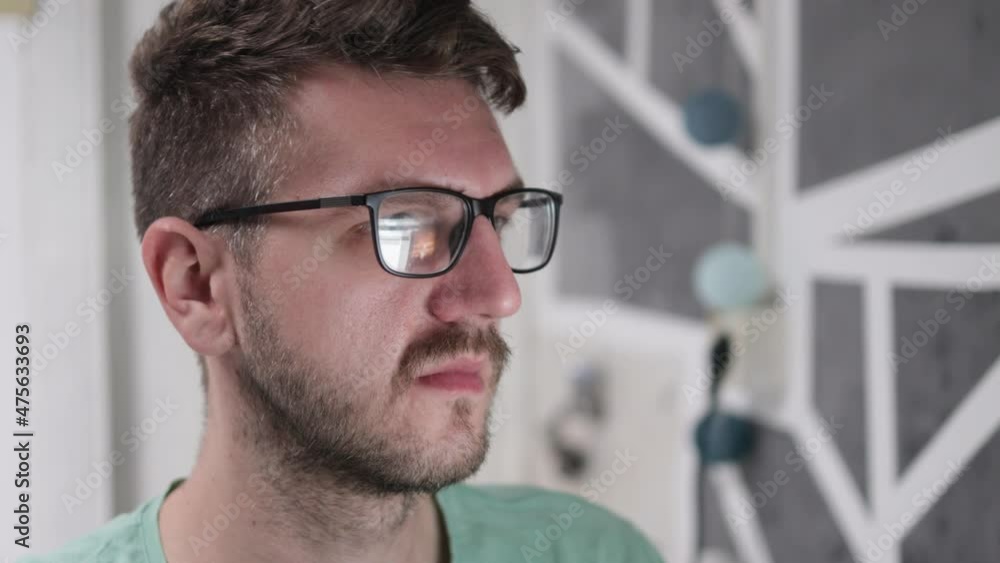 Aufkleber a closeup of a bosnian developer wearing glasses while working on the computer