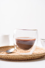 hot chocolate in a glass on a white background