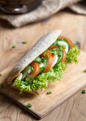 egg tomato and cucumber sandwich with salad
