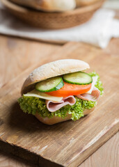 sandwich with gouda cheese, ham and vegetables