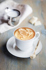 Latte art cappuccino coffee with milk foam
