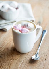 cup of cappuccino milk coffee with marshmallows