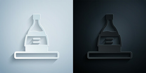 Paper cut Bottle of sake icon isolated on grey and black background. Paper art style. Vector