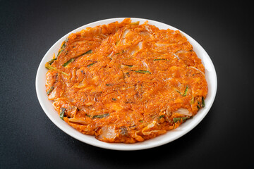 Korean Kimchi pancake or Kimchijeon - obrazy, fototapety, plakaty