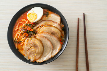 Ramen Noodles Spicy Tomyum Soup with Roast Pork