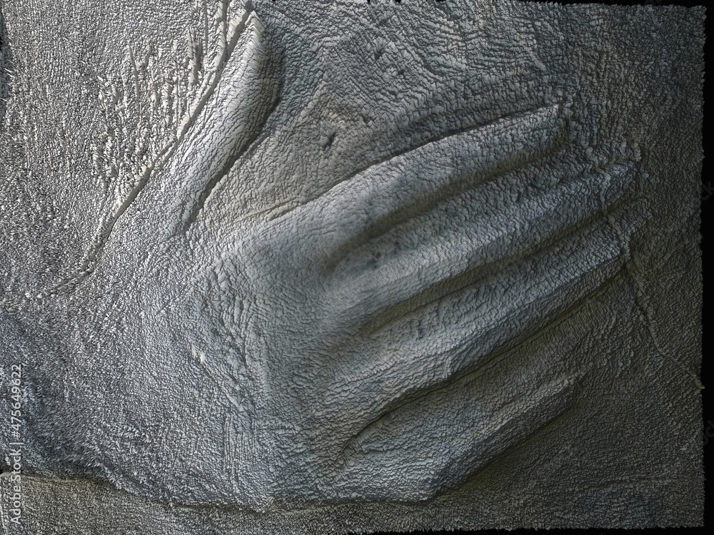 Poster pattern and design based on partial carving of a hand and fingers