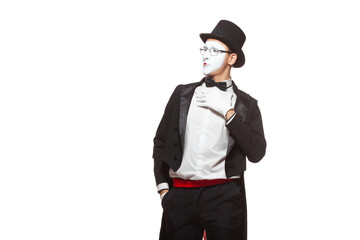 Portrait of a male mime artist performing, isolated on white background. Symbol of contempt,...