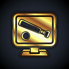 Gold Monitor with baseball ball and bat on the screen icon isolated on black background. Online baseball game. Vector