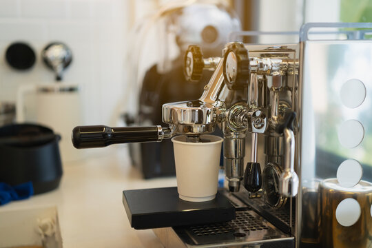 coffee machine making hot coffee in cafe. Making fresh coffee espresso. Coffee café concept