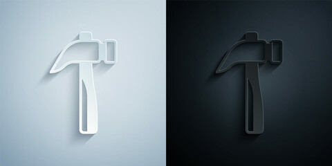 Paper cut Hammer icon isolated on grey and black background. Tool for repair. Paper art style. Vector