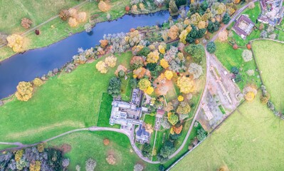 Top down panorama over Ugbrooke House and Gardens from a drone in the colors of fall, Exeter, Devon, England, Europe
