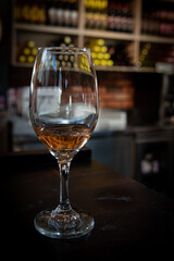 Glass of roze wine in a winery. Wine aroma tasting